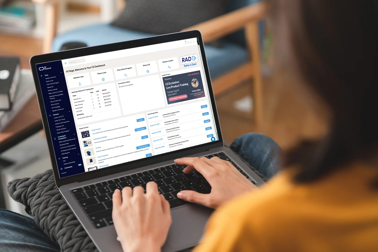 The C2 loan officer portal dashboard on a laptop